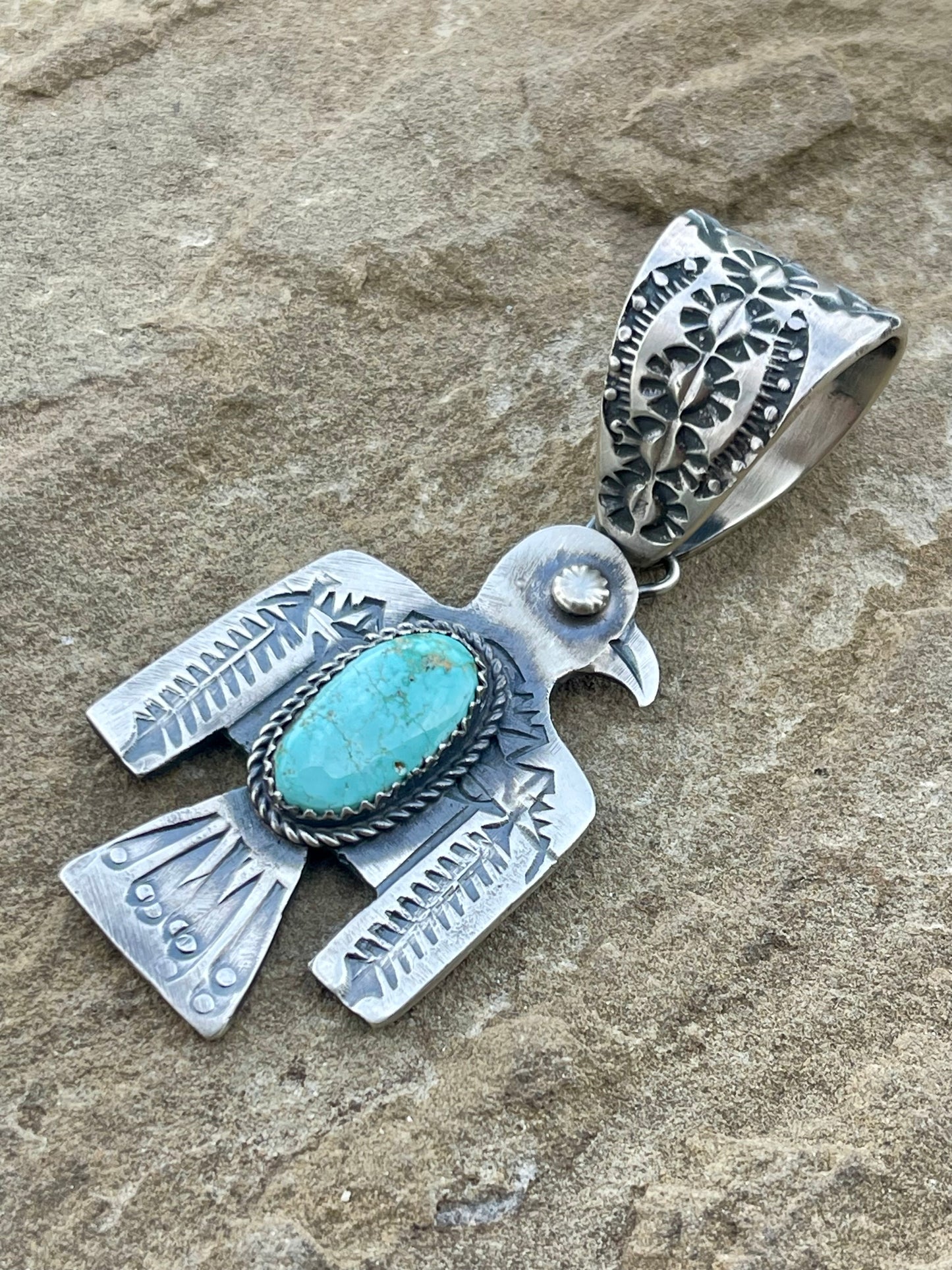 Thunderbird Stamped Turquoise Pendant