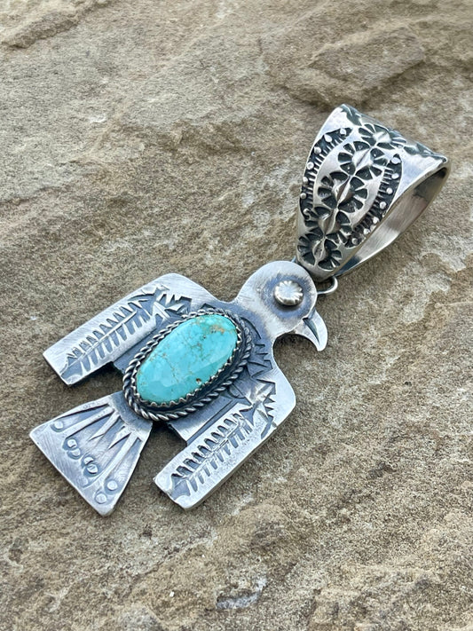 Thunderbird Stamped Turquoise Pendant